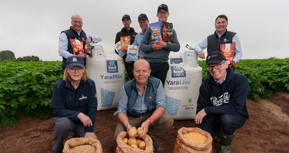 Yara and PepsiCo representatives with a farmer